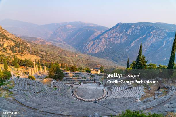 ancient greek theater in delphi, greece - ancient greece stock pictures, royalty-free photos & images