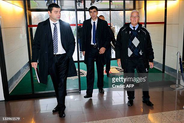 Serbian Football Federation General Secretary Zoran Lakovic and Serbia's Head Coach Radovan Curcic arrive for a meeting of the group A countries for...