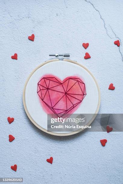 hand-embroidered hoop - embroidery frame stock pictures, royalty-free photos & images