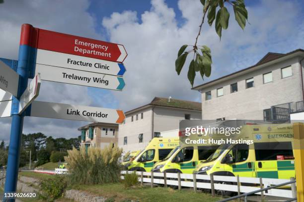 Ambulance crew and their patients wait to gain access to the Emergency Department at the Royal Cornwall Hospital on September 11, 2021 in Truro,...