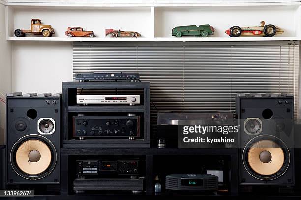 hi-fi-system mit vintage tin spielzeugauto - classic music stock-fotos und bilder
