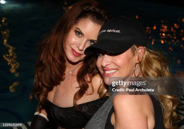 Playboy Playmate Carrie Stevens and Actress / Model Bobbie Jean Brown attend the Roosevelt Comedy Show at The Hollywood Roosevelt on September 10,...