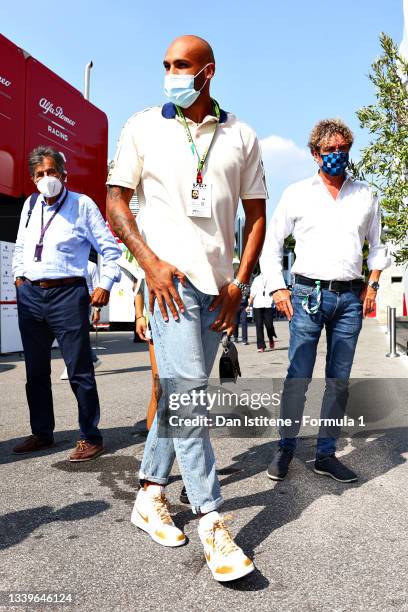 Olympic 100m Champion, Lamont Marcell Jacobs of Italy walks in the Paddock before the Sprint ahead of the F1 Grand Prix of Italy at Autodromo di...