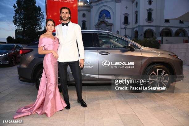 Gianmarco Tamberi and Chiara Bontempi arrive on the red carpet ahead of the "Qui Rido Io" screening during the 78th Venice Film Festival on September...