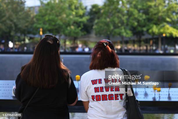 People attend the annual 9/11 Commemoration Ceremony at the National 9/11 Memorial and Museum on September 11, 2021 in New York City. During the...