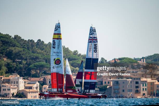 Phil Robertson, Helmsman of Spain SailGP Team sails and Ben Ainslie, Helmsman of Great Britain SailGP Team sail during Race Day One of SailGP on...