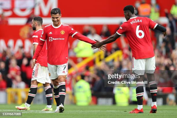 Cristiano Ronaldo of Manchester United interacts with Paul Pogba of Manchester United during the Premier League match between Manchester United and...