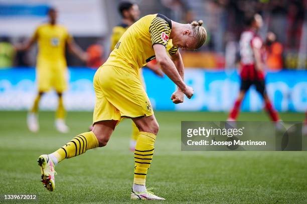 Erling Haaland of Dortmund celebrates after winning the during the Bundesliga match between Bayer 04 Leverkusen and Borussia Dortmund at BayArena on...
