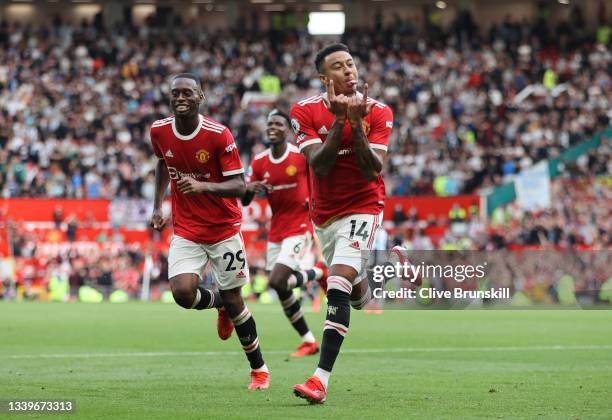 Jesse Lingard of Manchester United celebrates after scoring their side's fourth goal during the Premier League match between Manchester United and...