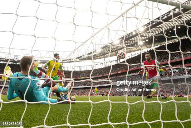 Pierre-Emerick Aubameyang of Arsenal scores their side's first goal during the Premier League match between Arsenal and Norwich City at Emirates...