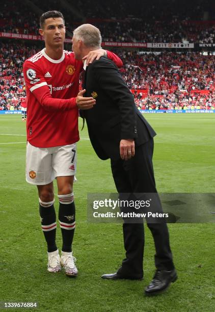 Manager Ole Gunnar Solskjaer of Manchester United celebrates with Cristiano Ronaldo after the Premier League match between Manchester United and...