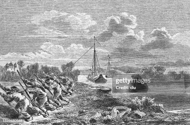 Man Roop In Ship Man Pulling Rope And A Ship Photos and Premium High Res Pictures ...
