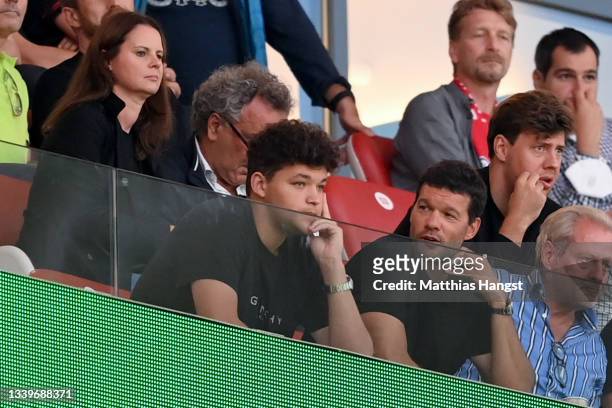 Michael Ballack attends the game with his son Louis during the Bundesliga match between RB Leipzig and FC Bayern München at Red Bull Arena on...