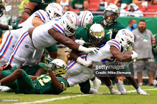 Dameon Pierce of the Florida Gators scores a touchdown during a game against the South Florida Bulls at Raymond James Stadium on September 11, 2021...