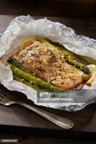 foil packed salmon - baked salmon stock pictures, royalty-free photos & images