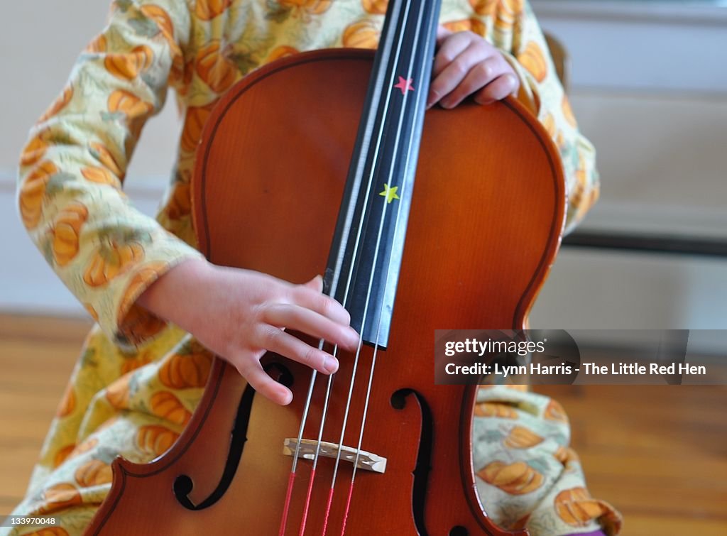 Girl practicing cello