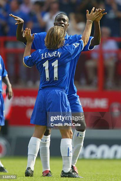 Carlton Cole of Chelsea celebrates scoring their second goal to get them back on track to win the game during the Barclaycard Premiership match...