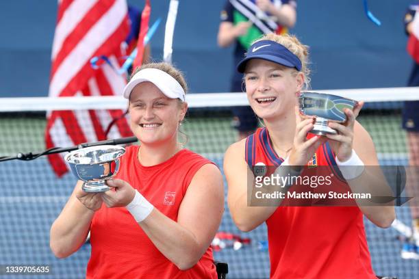 Aniek Van Koot of the Netherlands and Diede de Groot of the Netherlands celebrate with the championship trophies after defeating Yui Kamiji of Japan...