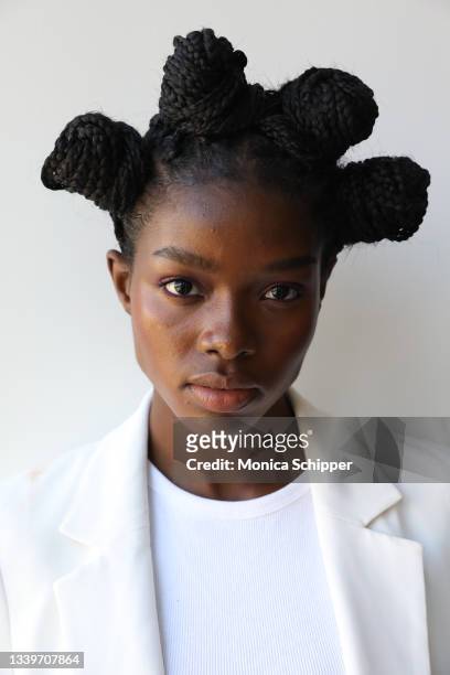 Model prepares backstage for TRESemme x Studio 189 during New York Fashion Week at Spring Studios on September 11, 2021 in New York City.