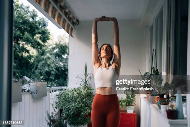 no gym required: how to get fit at home - woman yoga bildbanksfoton och bilder