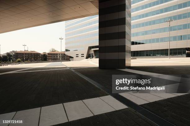 milan modern square with concrete building - milan square stock pictures, royalty-free photos & images