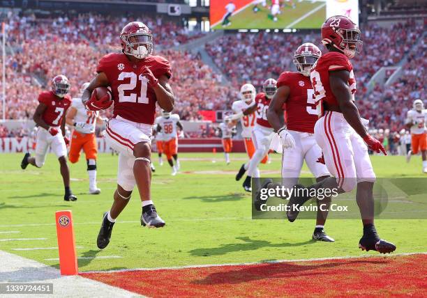 Jase McClellan of the Alabama Crimson Tide returns a blocked punt for a touchdown against the Mercer Bears during the first half at Bryant-Denny...