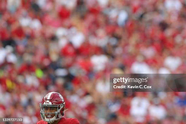 Bryce Young of the Alabama Crimson Tide runs the offense against the Mercer Bears during the first half at Bryant-Denny Stadium on September 11, 2021...