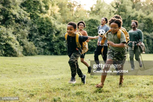 time in nature strengthens families - youth activities stock pictures, royalty-free photos & images