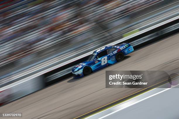 Dale Earnhardt Jr., driver of the Unilever United For America Chevrolet, drives during the NASCAR Xfinity Series Go Bowling 250 at Richmond Raceway...