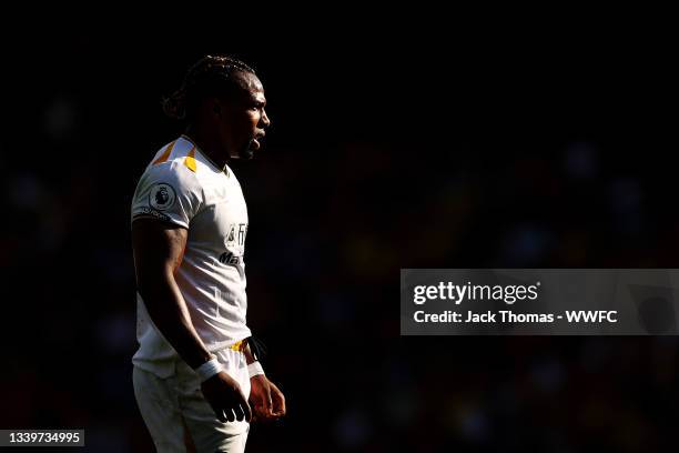 Adama Traore of Wolverhampton Wanderers looks on during the Premier League match between Watford and Wolverhampton Wanderers at Vicarage Road on...