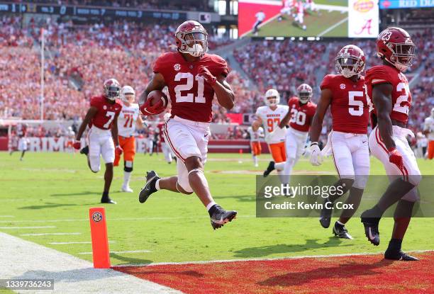 Jase McClellan of the Alabama Crimson Tide returns a blocked punt for a touchdown against the Mercer Bears during the first half at Bryant-Denny...