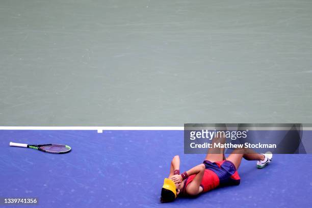 Emma Raducanu of Great Britain celebrates winning championship point to defeat Leylah Annie Fernandez of Canada during the second set of their...