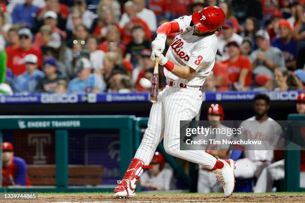 Bryce Harper of the Philadelphia Phillies hits a solo home run during the seventh inning against the Colorado Rockies at Citizens Bank Park on...