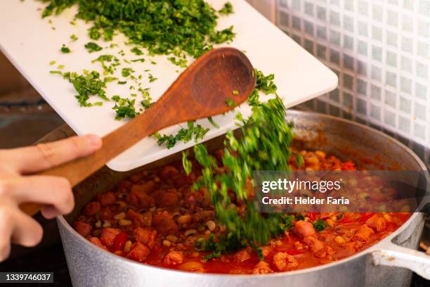 preparing a chilli con carne - cooking chili stock pictures, royalty-free photos & images