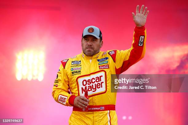 Ryan Newman, driver of the Oscar Mayer Bacon Ford, waves to fans during pre-race ceremonies prior to the NASCAR Cup Series Federated Auto Parts 400...
