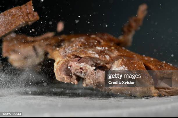 sliced sauced duck on the chopping board - salt pepper stock pictures, royalty-free photos & images
