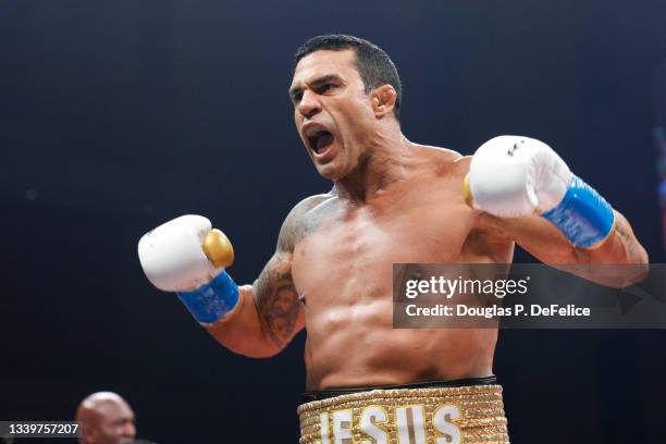 Vitor Belfort reacts after defeating Evander Holyfield during the first round of the fight during Evander Holyfield vs. Vitor Belfort presented by...