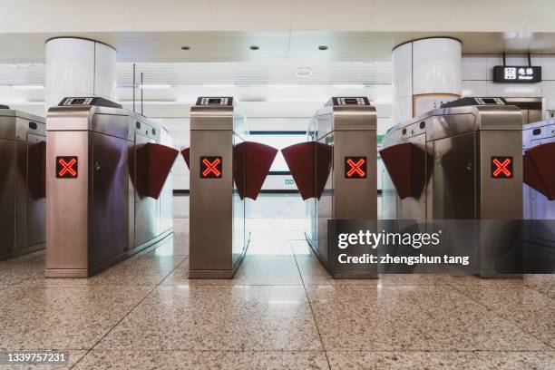 barrier gate in subway. - entering turnstile stock pictures, royalty-free photos & images