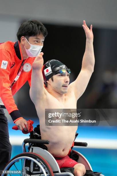 Takayuki Suzuki of Team Japan celebrates winning the bronze medal after competing in the Swimming Men's 50m Breaststroke - SB3 Final on day 1 of the...