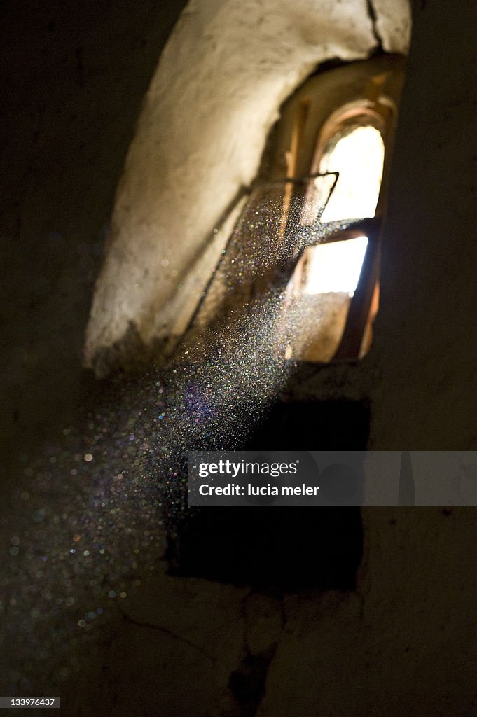 Beam of light in dusty environment