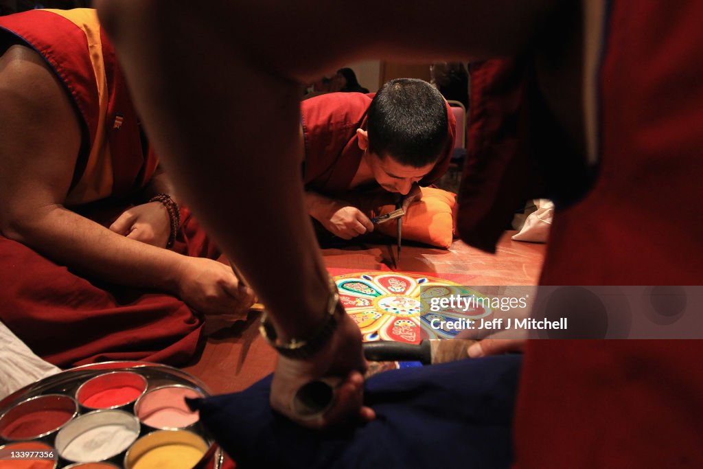 Tibetan Monks From The Panchen Lama's Monastery Create A Sand Mandala Artwork