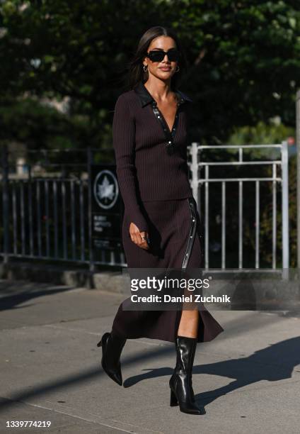 Camila Coelho is seen wearing a brown Jonathan Simkhai outfit outside the Jonathan Simkhai show during New York Fashion Week S/S 22 on September 11,...
