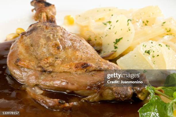 duck leg in prune sauce - braised stock pictures, royalty-free photos & images