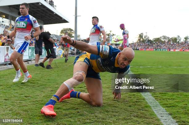 Blake Ferguson of the Eels scores a try during the NRL Elimination Final match between Parramatta Eels and Newcastle Knights at Browne Park, on...