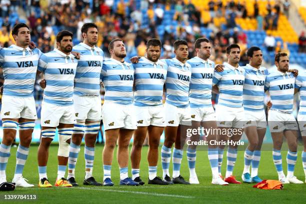 Argentina sing the national anthem ahead of the Rugby Championship match between the New Zealand All Blacks and Argentina Pumas at Cbus Super Stadium...