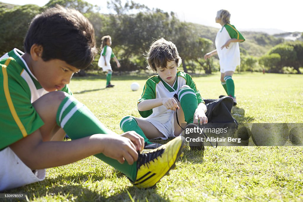 Boys getting ready to play football