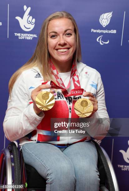 Hannah Cockroft of Team Great Britain poses for a photo with her two gold medals as she attends the National Lottery's ParalympicsGB Homecoming at...