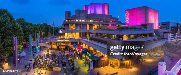 london people outdoor restaurants national theatre southbank illuminated night panorama - royal national theater stock pictures, royalty-free photos & images