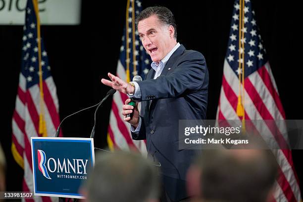 Republican presidential candidate former Massachusetts Gov. Mitt Romney speaks during an appearance with U.S. Sen. John Thune before employees at the...