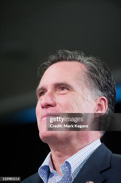 Republican presidential candidate former Massachusetts Gov. Mitt Romney speaks during an appearance with U.S. Sen. John Thune before employees at the...